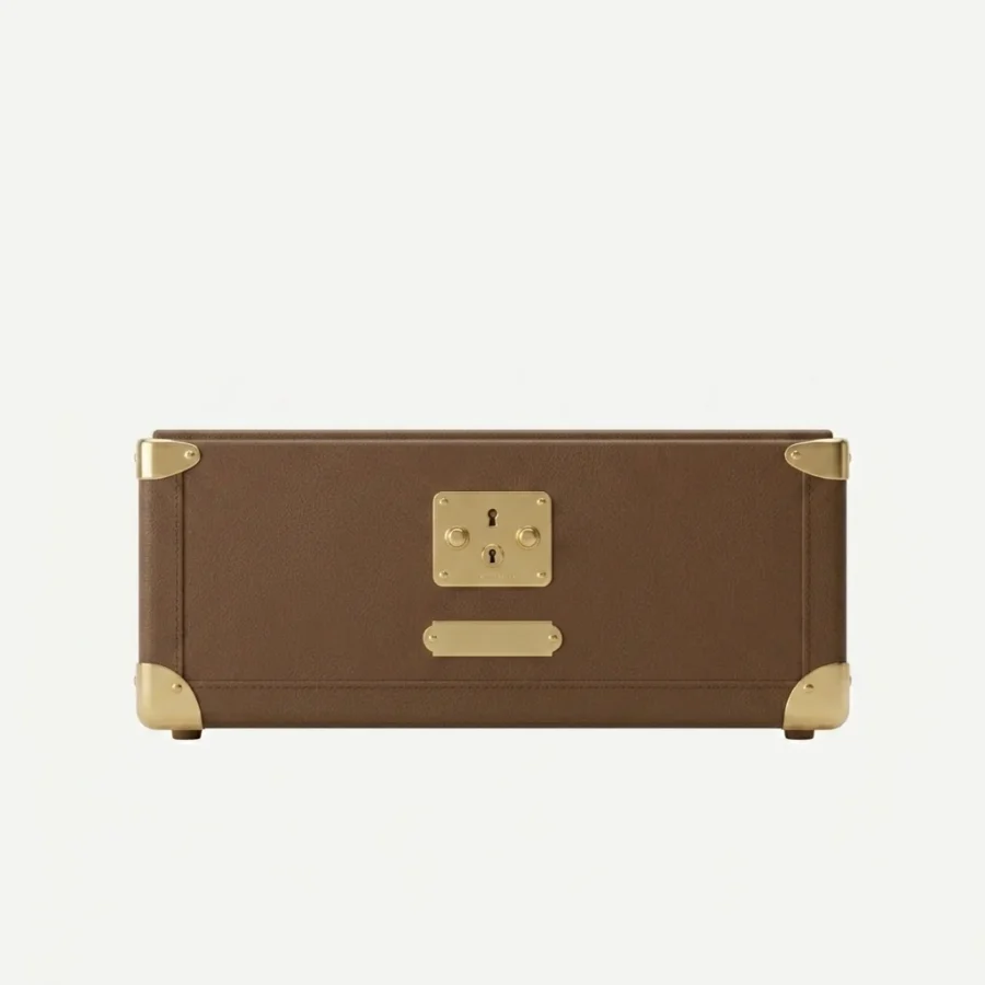 Front elevation of the Monty cat bed showing the brass lock plate and engraved MONTY nameplate